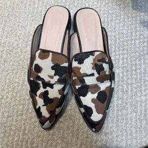 Cow print mules 
NWOT